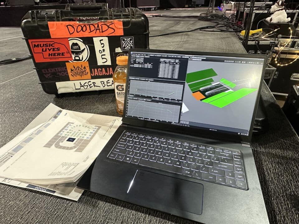 M. Stryker feeds TruPulse measurements into loudspeaker coverage software while prepping for another live Mannheim Steamroller performance.
